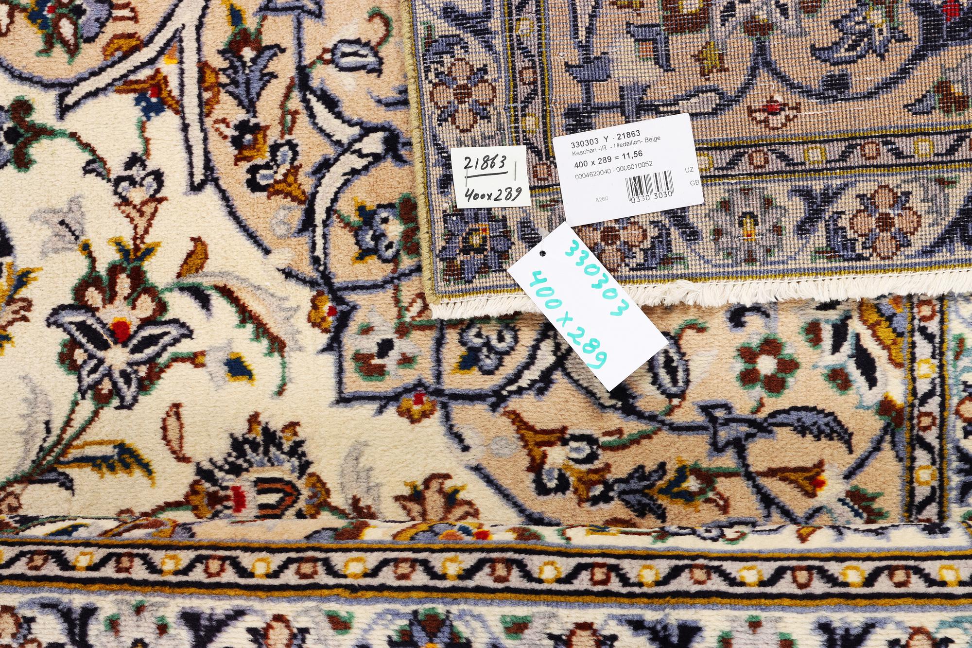 A Kashan carpet, c. 400 x 289 cm.