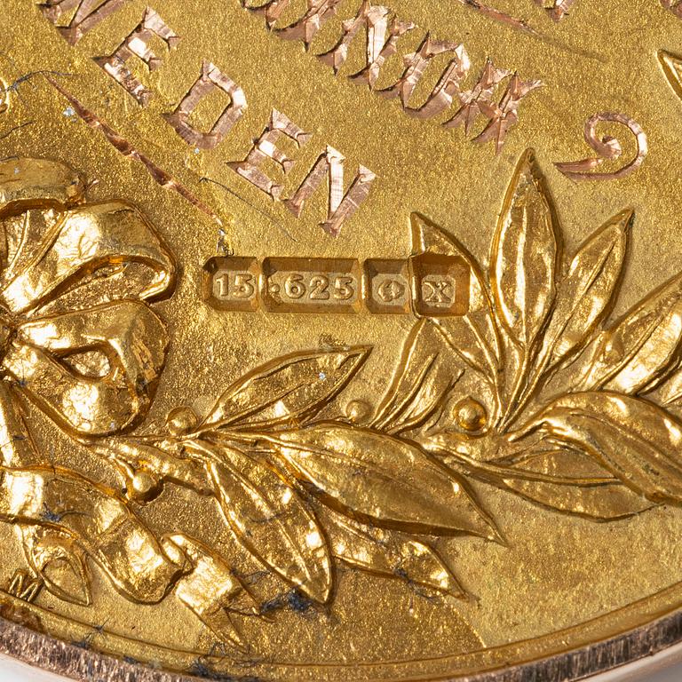 A medal, 15K gold, England, 1922.