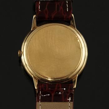 ARMBANDSUR, herr, 18 k guld, "Genève", Omega, 1900-talets andra hälft, total vikt 33 g.
