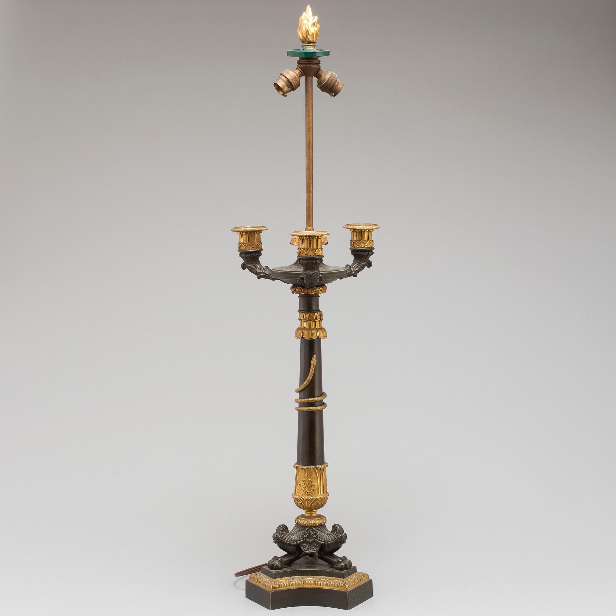A first half of the 19th century bronze table lamp.