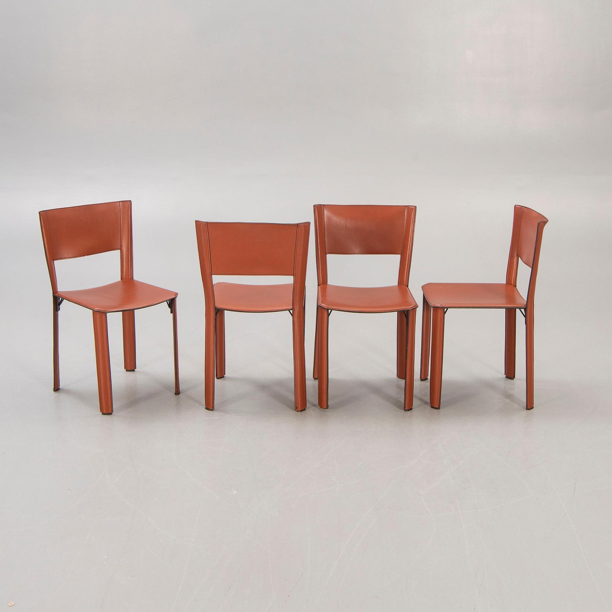 A set of four Matteo Grassi leather chairs later part of the 20th century.