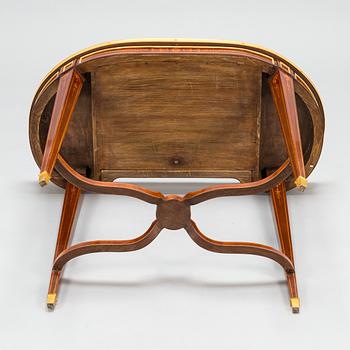 A Directoire style marquetry table from around year 1900.