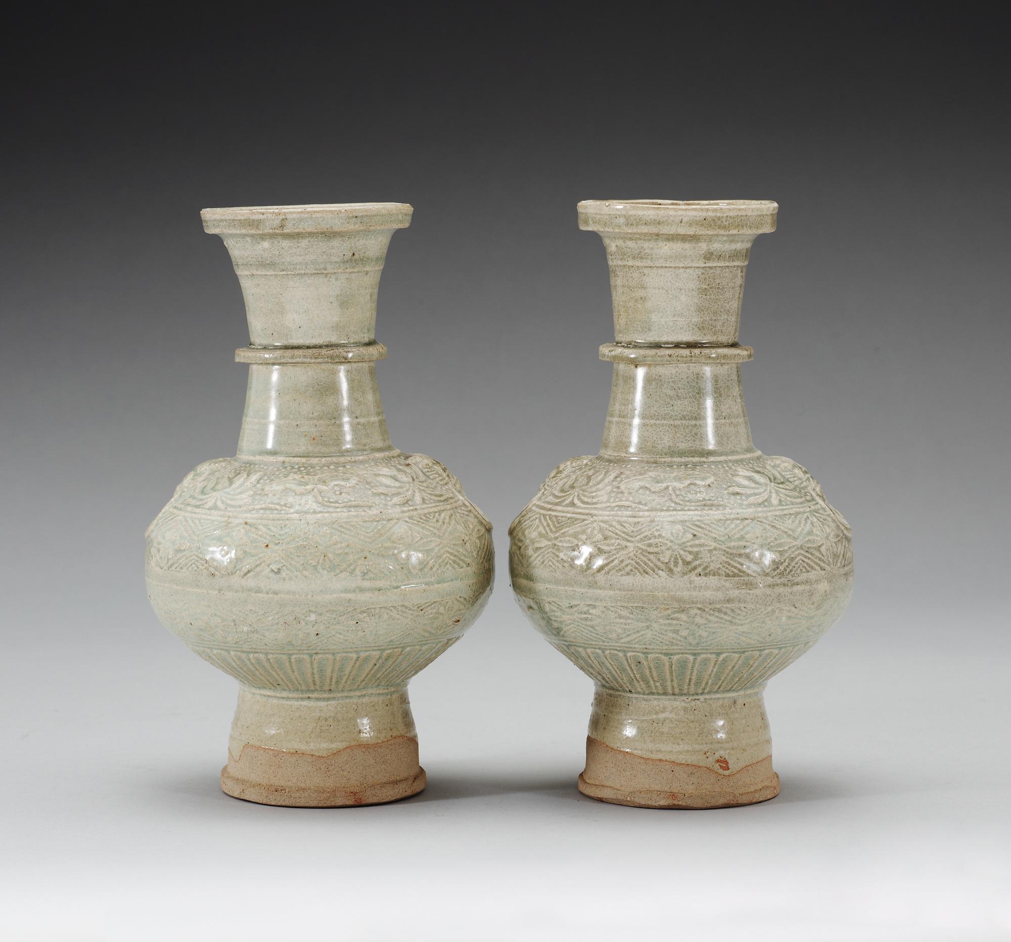 A pair of pale celadon glazed vases, Song/Yuan dynasty.