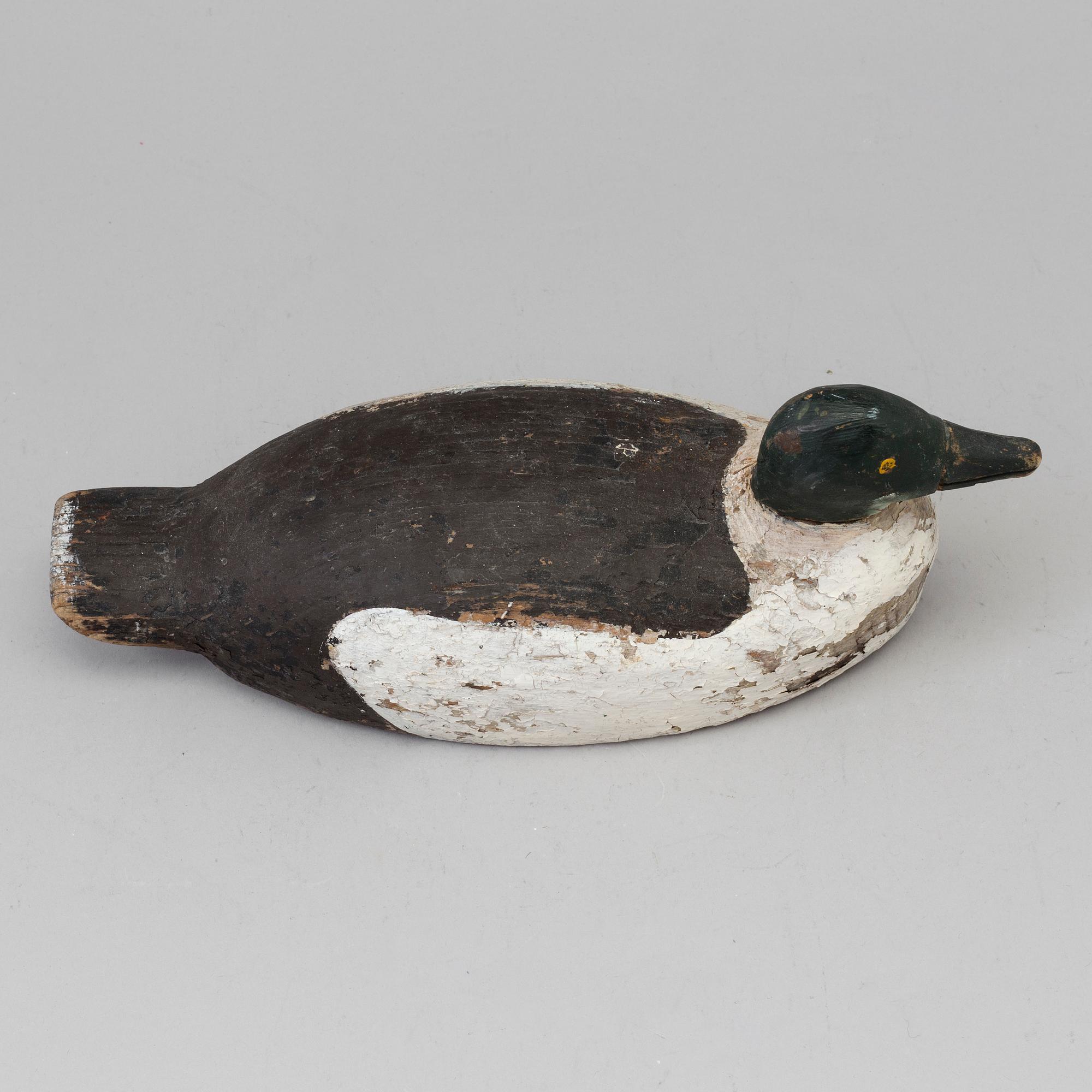 A duck hunt wood decoy circa 1900.