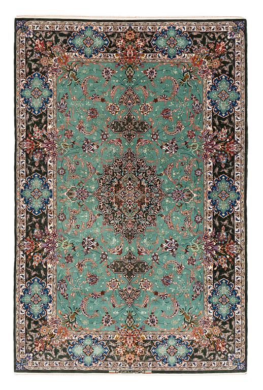 A rug, old Esfahan, part silk, signed, ca 225 x 149 cm (ca 1,5-2,5 cm flat weave at the ends).