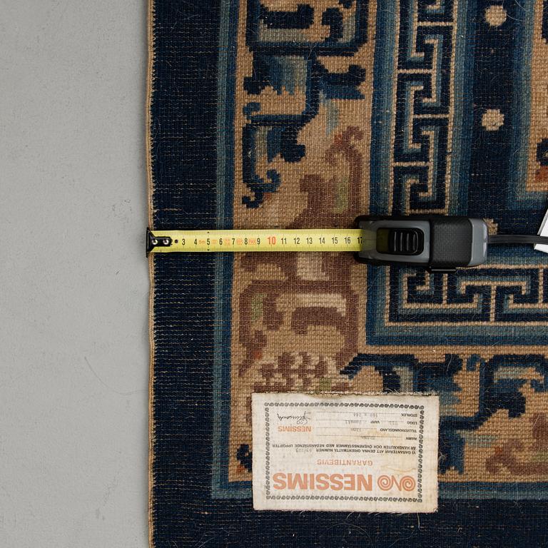A Chinese carpet, ca 244 x 168 cm.