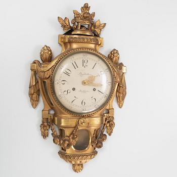 A Gustavian giltwood cartel clock by A. Bourdillon (watchmaker active in Stockholm 1761-99).