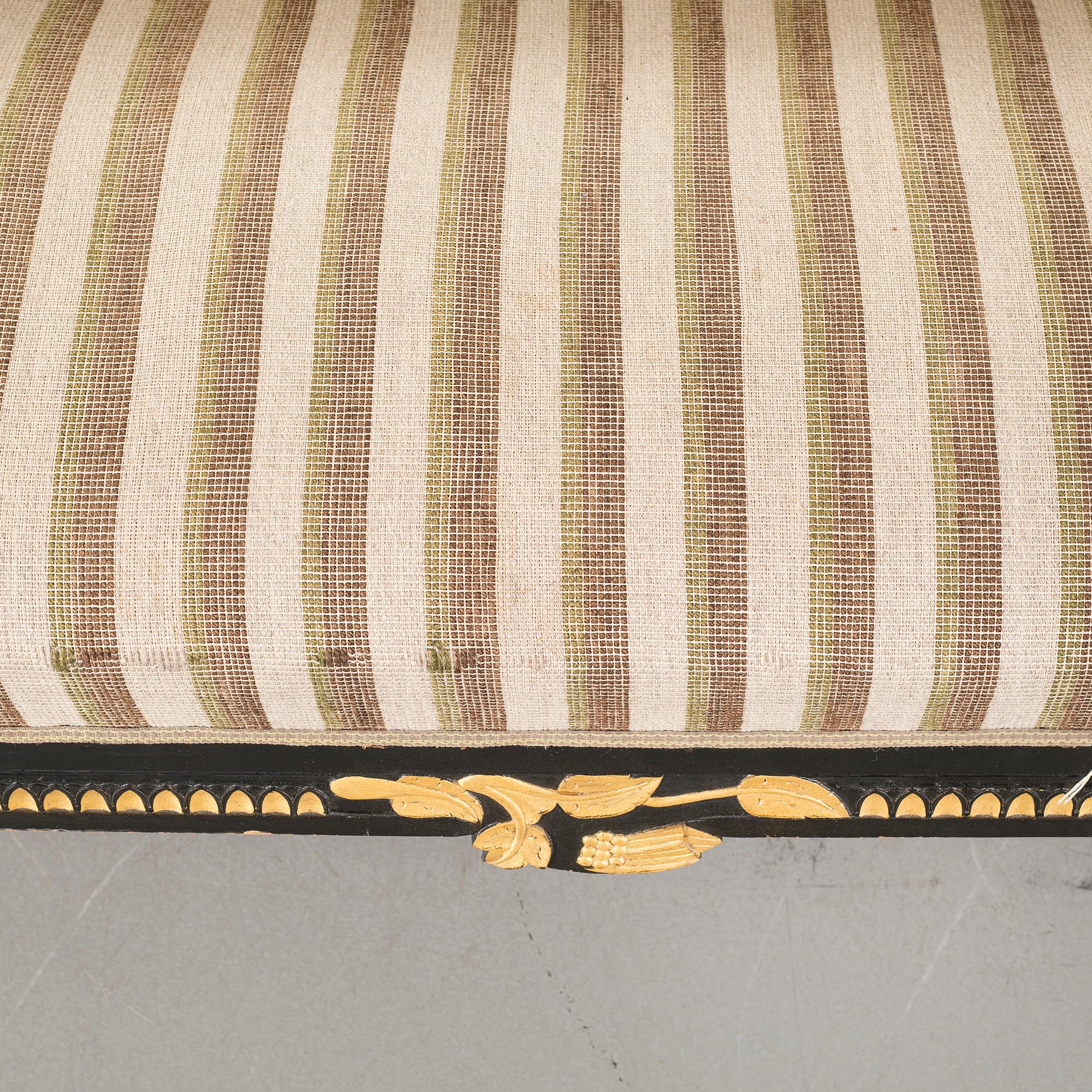 A gustavian style table and sofa, around the year 1900.