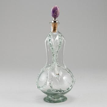 A glass bottle, 18/19th Century.