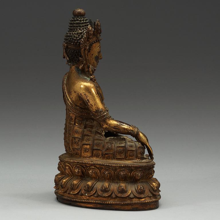 A Tibetan gilt bronze figure of Bodhisattva, presumably 17/18th Century.