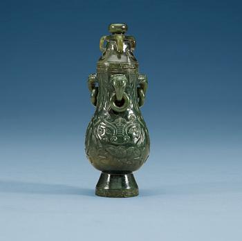 A jadeit vase with cover, Qing dynasty.