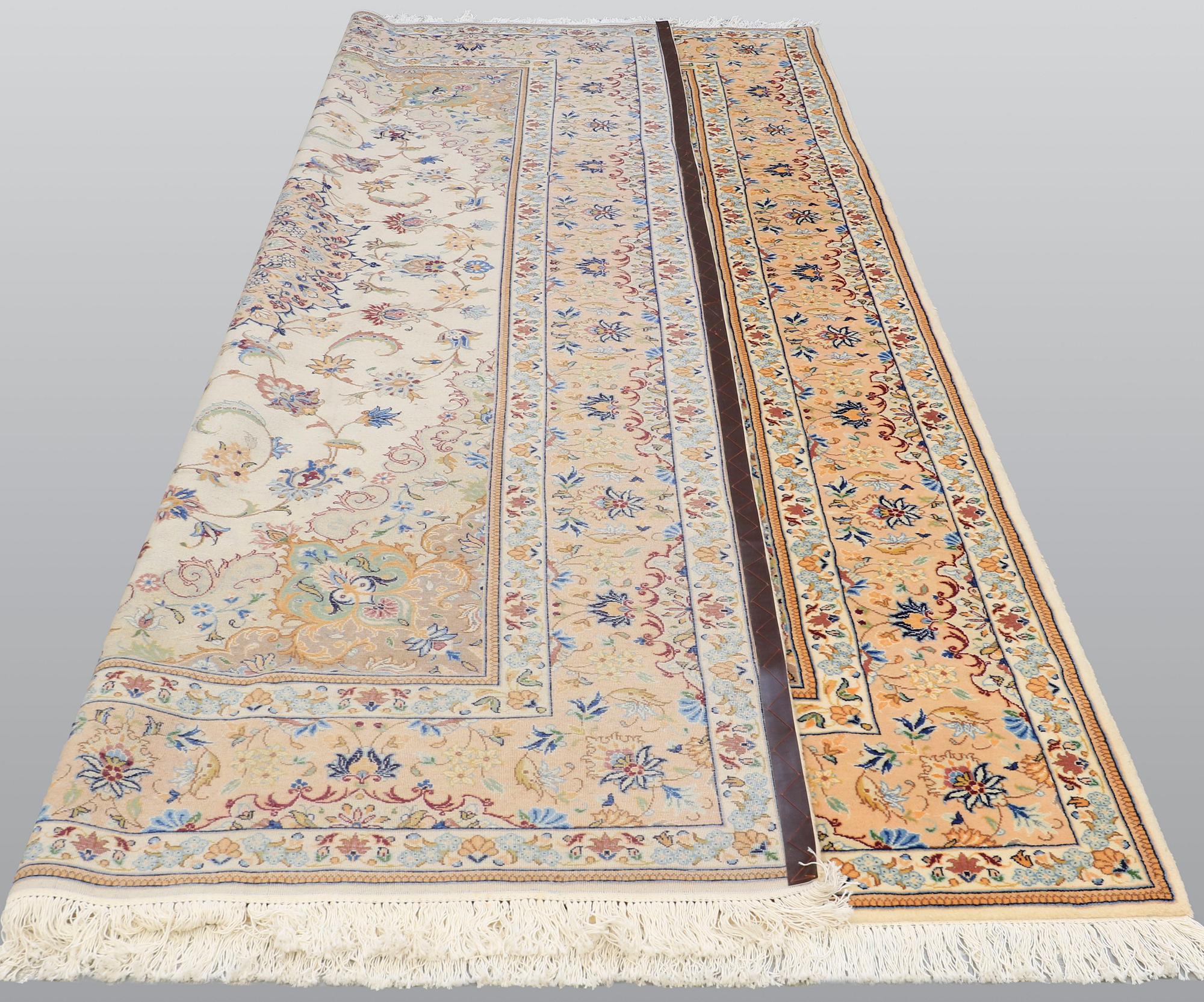 A carpet, Tabriz, ca 385 x 247 cm.