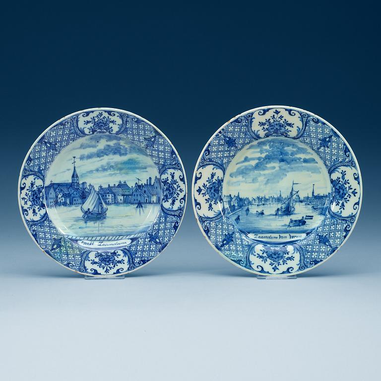 A pair of Delft faience topographical dinner plates, 18th Century.