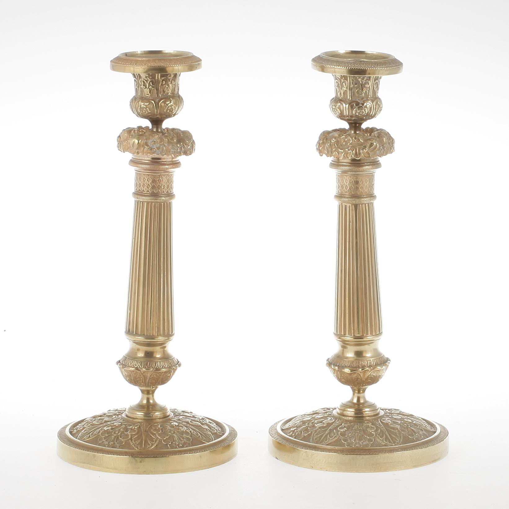 LJUSSTAKAR, ett par, mässing, senempire, 1800-talets första hälft/mitt.