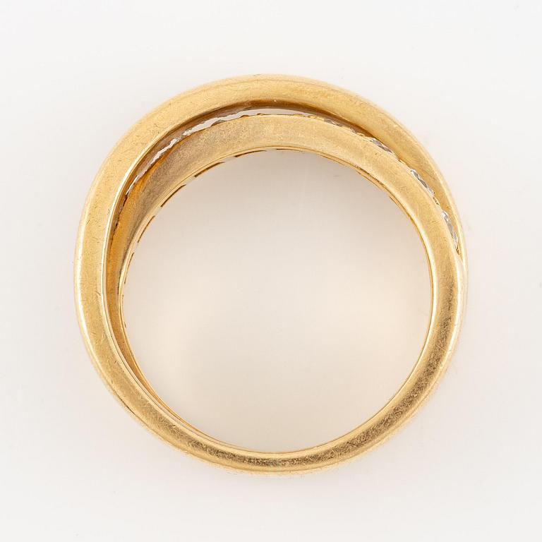 A Cartier ring, "Nouvelle Vague", 18K gold with round brilliant-cut diamonds.