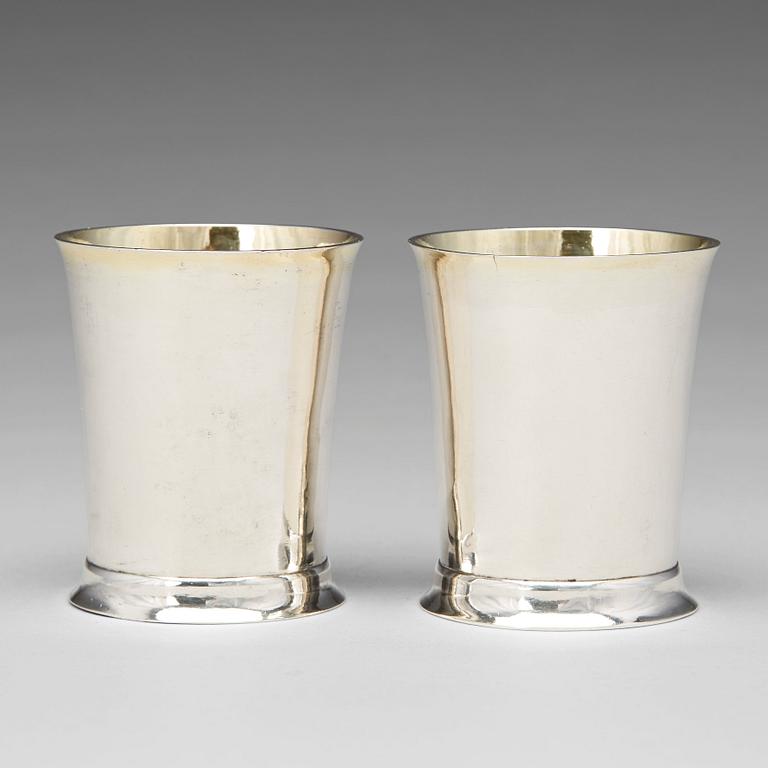 A pair of Swedish Empire parcel-gilt beakers, mark of Lorenz Georg Weis, Norrkoping 1814.