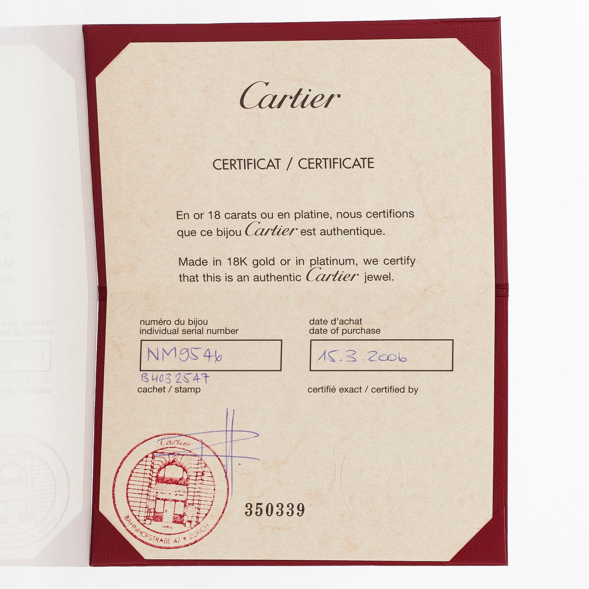 Cartier, an 18K white gold 'Love' ring with three brilliant-cut diamonds.