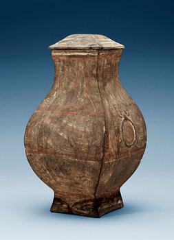 1610. A painted jar with cover, Western Han dynasty, (206 BC - 220 AD).
