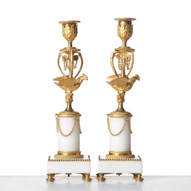 A pair of Louis XVI late 18th century candlesticks.