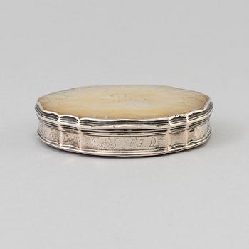 An 18th century silver and mother-of-pearl rococo snuff box.