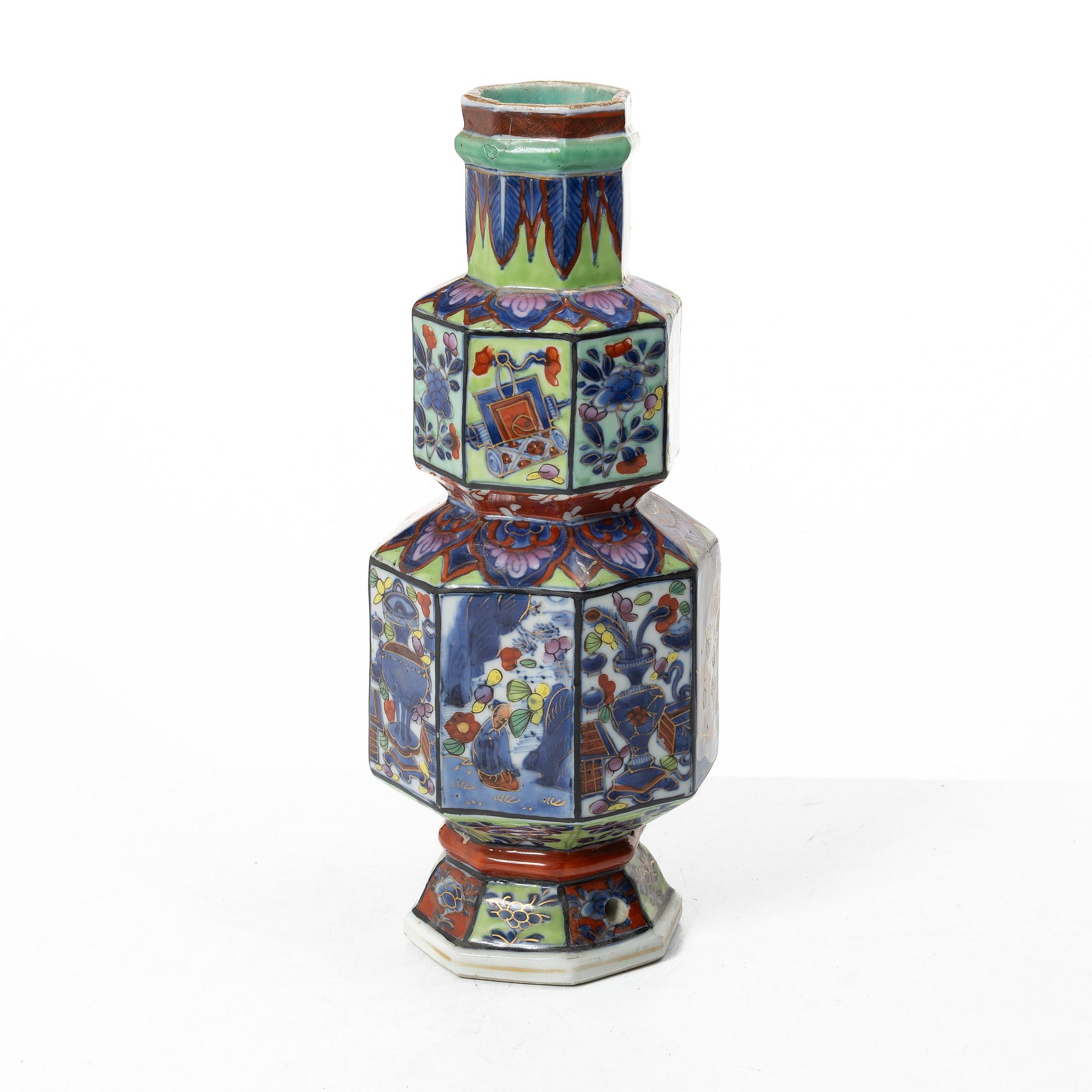 A 'clobbered' vase, Qing dynasty, Kangxi (1662-1722).