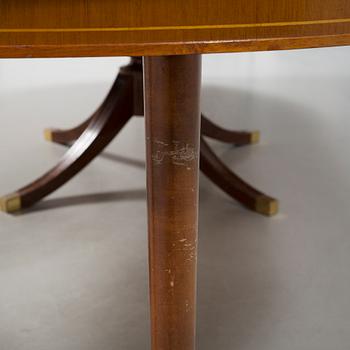 A diningroom table from the second quarter of the 20th century.