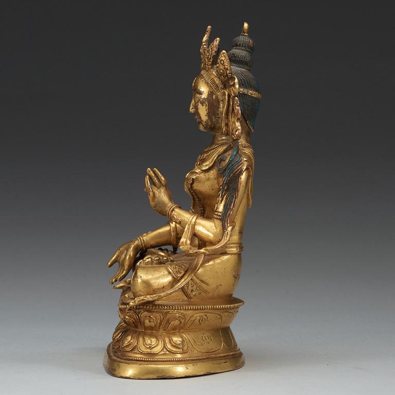 A Sinotibetan gilt bronze figure of Tara, Qing dynasty.