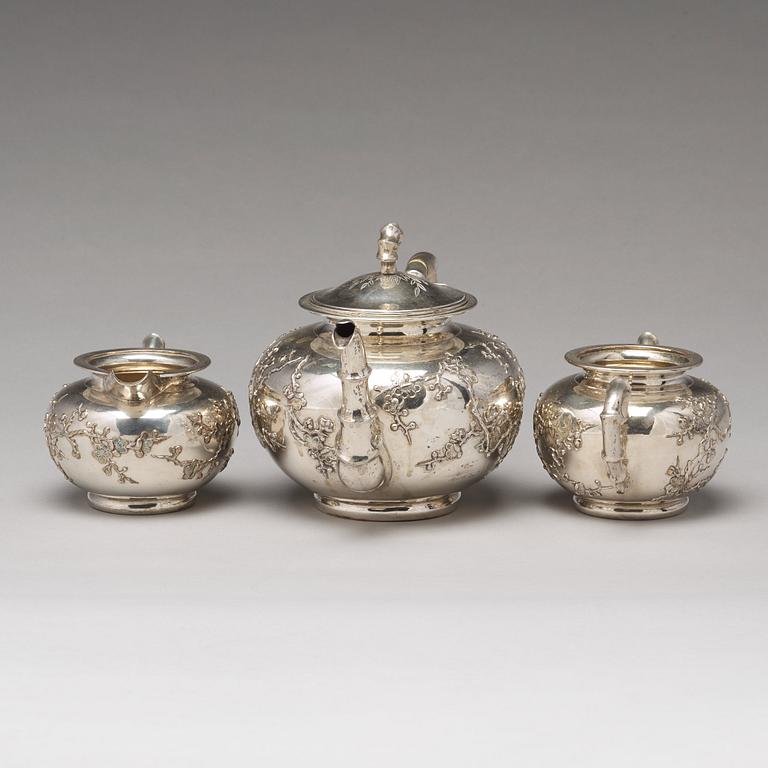 A Chinese export silver three-piece tea service, mark of Luen Wo, Shanghai, circa 1880-1925.