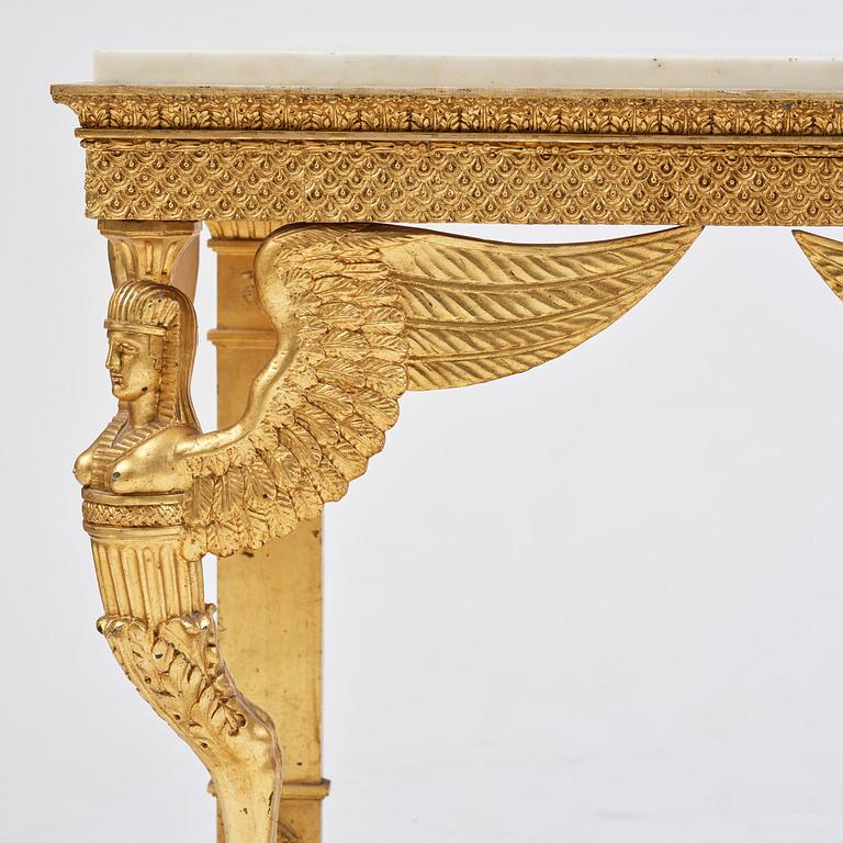 A late Gustavian giltwood console in the manner of J. Frisk, Stockholm, early 19th century.
