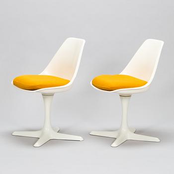 Set of 8 vintage swivel chairs model 115 and a table by Maurice Burke for Arkana, United Kingdom, 1960s.