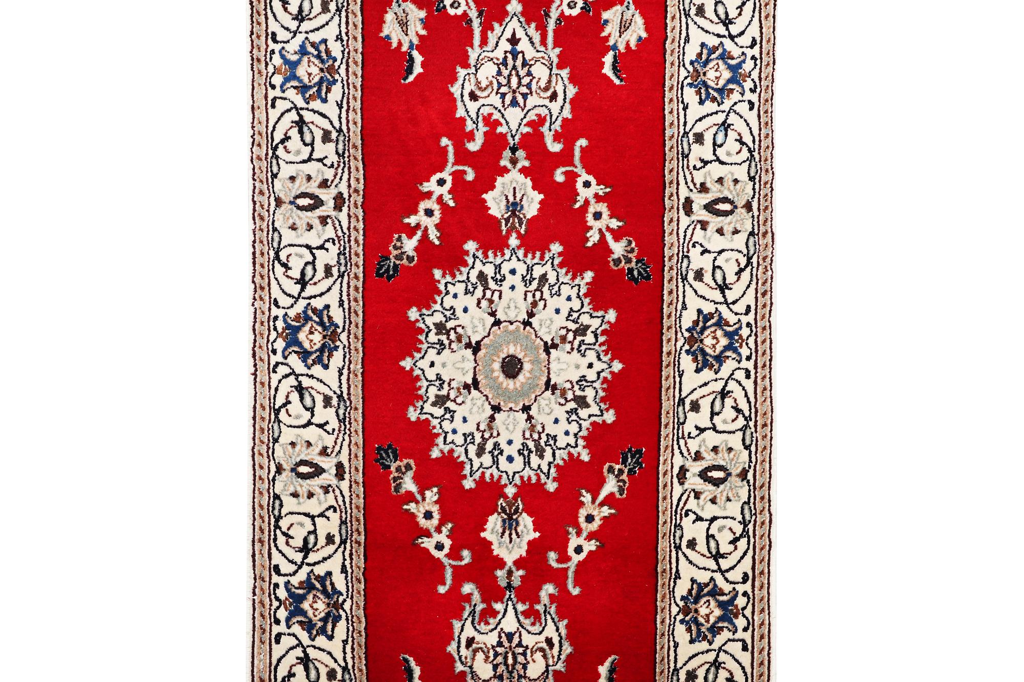 A runner carpet, Nain, part silk, 9 laa, c. 378 x 84 cm.