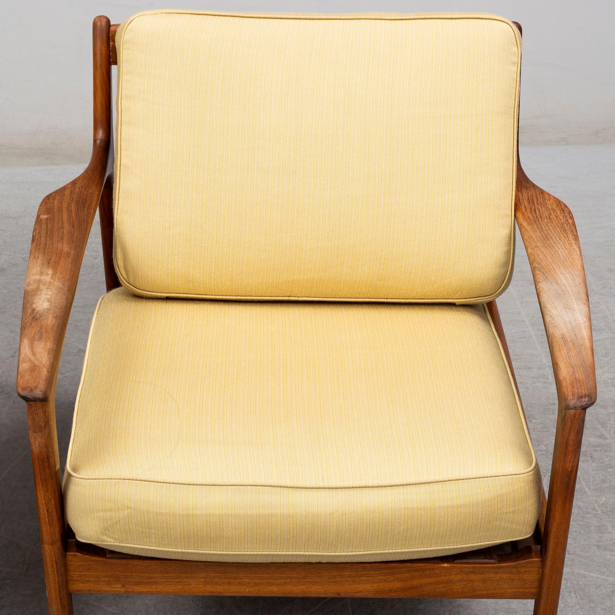 A pair of USA-75 easy chairs by Folke Ohlsson, DUX.