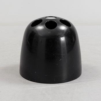 EMMA GISMONDI SCHWEINBERGER, a 'Dedalo' plastic umbrella stand from Artemide, Milan, Italy.