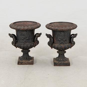 Garden urns, a pair by Skoglund & Olsson, 20th century, cast iron.