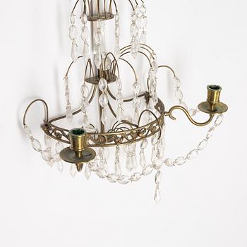 A pair of Gustavian style two-branch wall lights, 20th century.