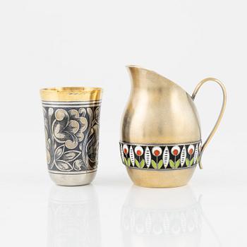 A Russian Silver-Gilt and Enamel Creamer and a Parcel-Gilt Silver Niello Beaker, Leningrad 1960s.