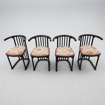 A set of four armchairs by Mundus, first half of the 20th century.