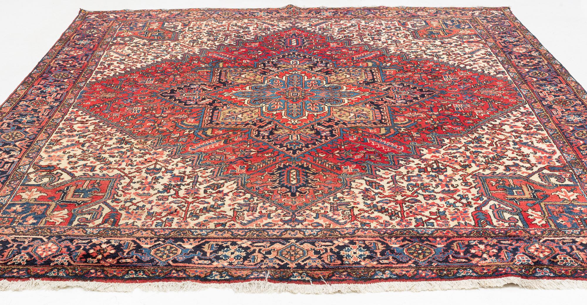 An oriental carpet, c. 330 x 285 cm.