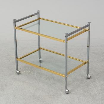A metal and glass drinks trolley, 1970's/80's.
