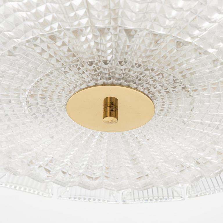 Carl Fagerlund, a glass and brass ceiling light, Orrefors.