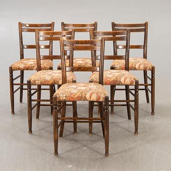 A set of six early 1900s chairs.
