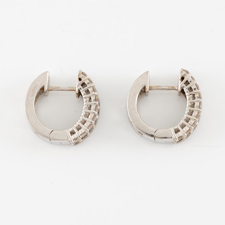 Earrings, a pair, 18K white gold set with baguette and brilliant-cut diamonds.
