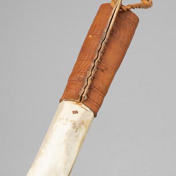 Esse Poggats, a rendeer horn Sami knife, signed.