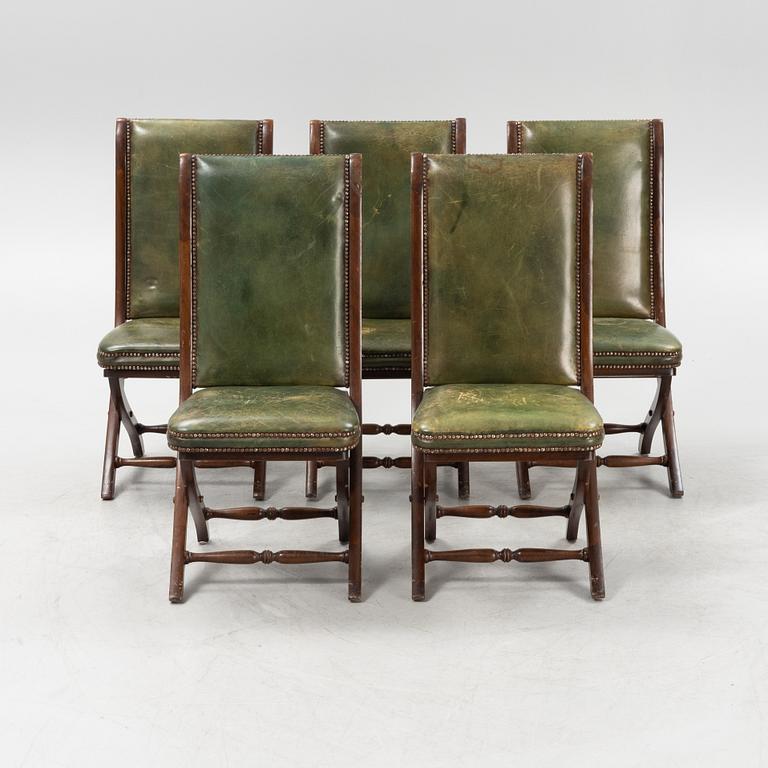 A set of five mahogany and leather upholstered chairs, England, second half of the 20th Century.