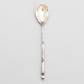 A Russian silver tea glass holder and a tea spoon, Moscow, Alexander Fuld 1889 and Antip Kuzmichev 1888. Glass, Finland.