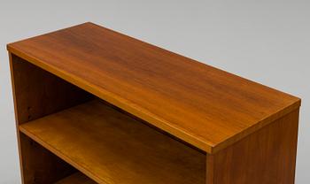 A 1940s walnut veneered shelf.