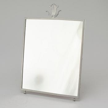 A mirror by Edvin Ollers for Schreuder & Olsson, Stockholm in 1930.