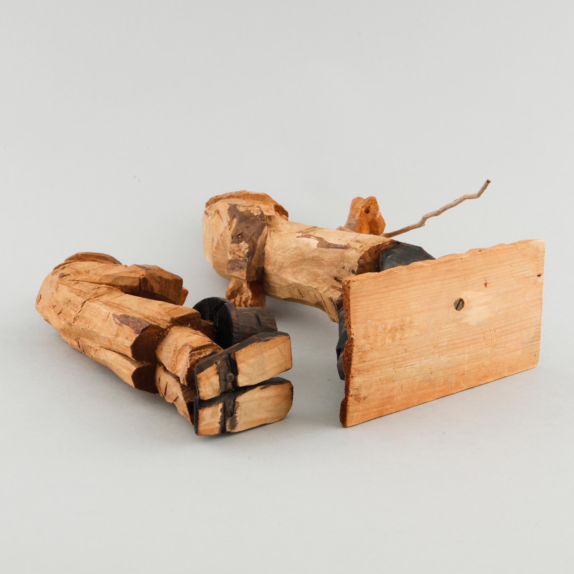 Rwo unsigned wooden skulptures from the 20th century.