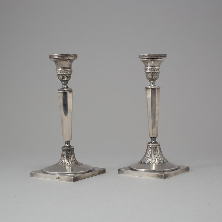 A pair of Russian silver candlesticks, Moscow, 1880, marked LM.