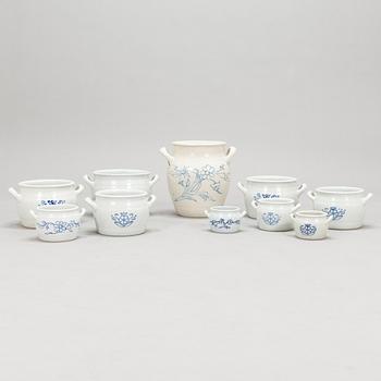 Set of nine ceramic butter jars and a honey urn, Arabia, 1930/40s.